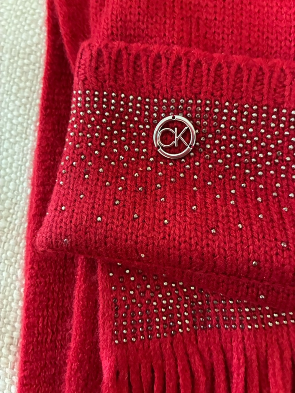 Calvin KleinNWT Scarf & Hat Set
Red Rouge with Silver CK
Logo & Sparkle - Picture 7 of 9